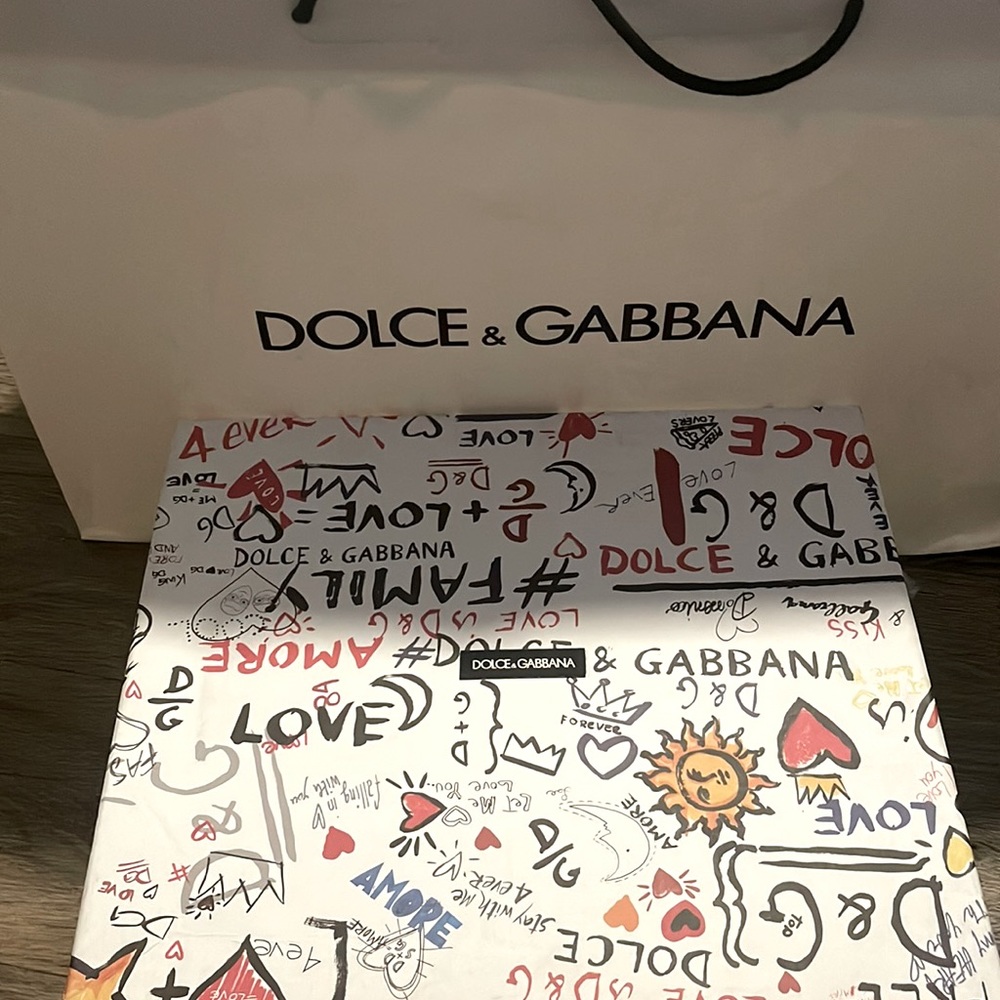 Dolce and Gabbana red, black, and white high tops size 41.